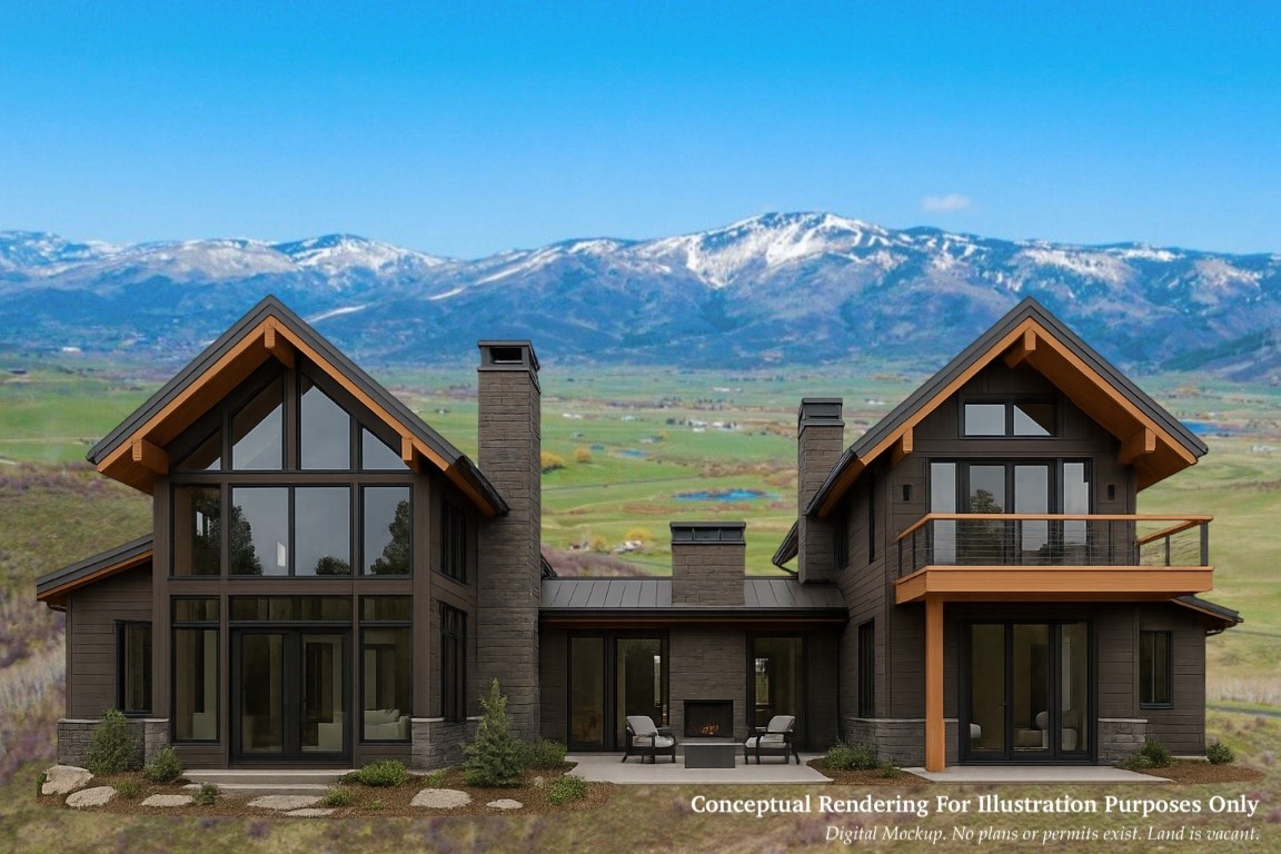 30665 Marshall Ridge Steamboat Springs, CO 80487 - Photo 25 of 25 a front view of a house with a yard and balcony
