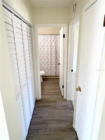 a view of a bathroom from the hallway