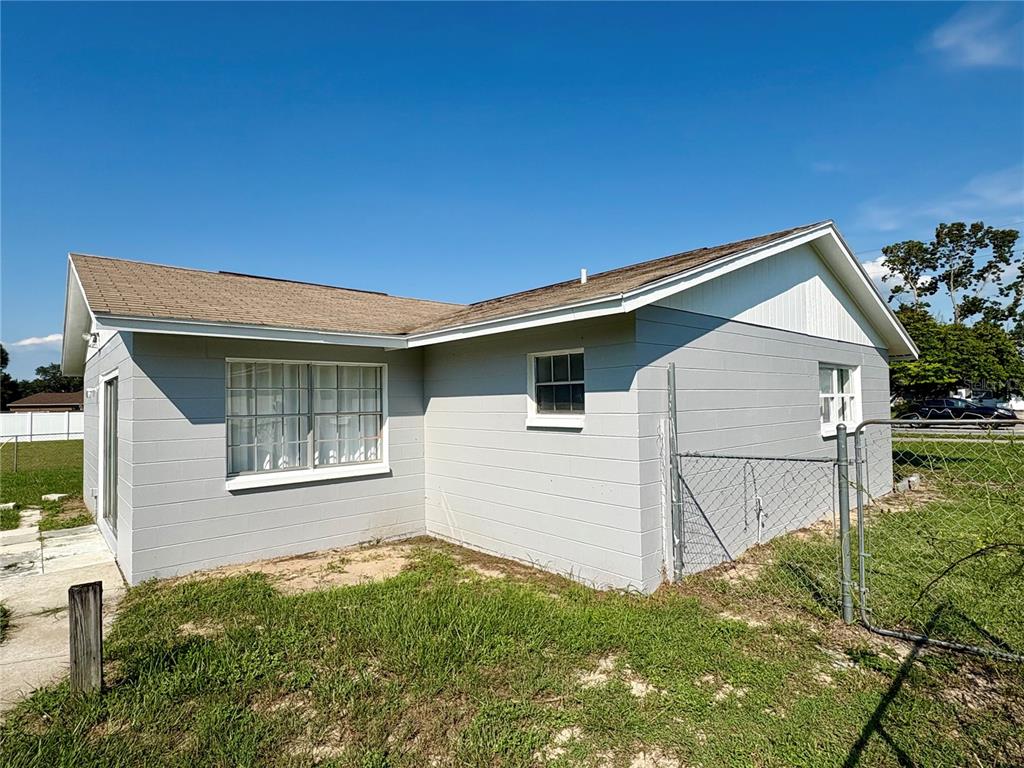 5389 Mariner Boulevard Spring Hill, FL 34609 - Photo 2 of 17 a view of backyard of house with garden
