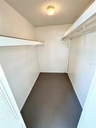a view of a room with racks on the wall