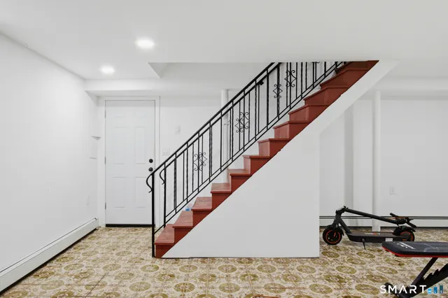 a view of entryway with wooden floor