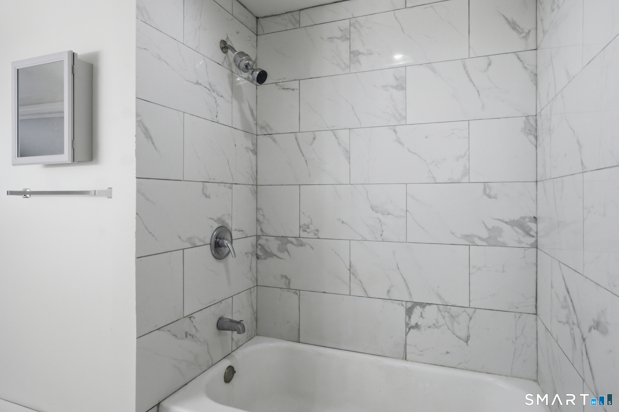 590 North Walnut Street Waterbury, CT 06704 - Photo 20 of 37 a bathroom with a bathtub