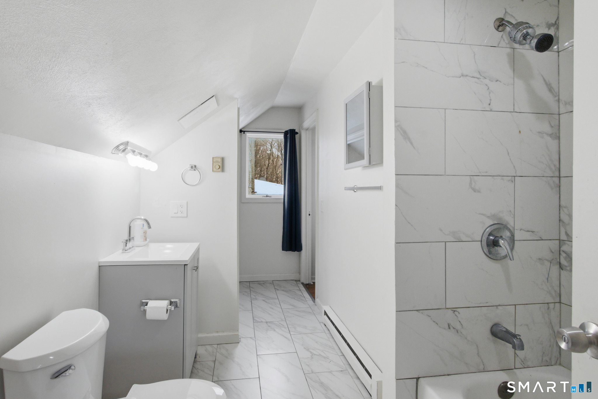 590 North Walnut Street Waterbury, CT 06704 - Photo 21 of 37 a bathroom with a sink toilet and shower