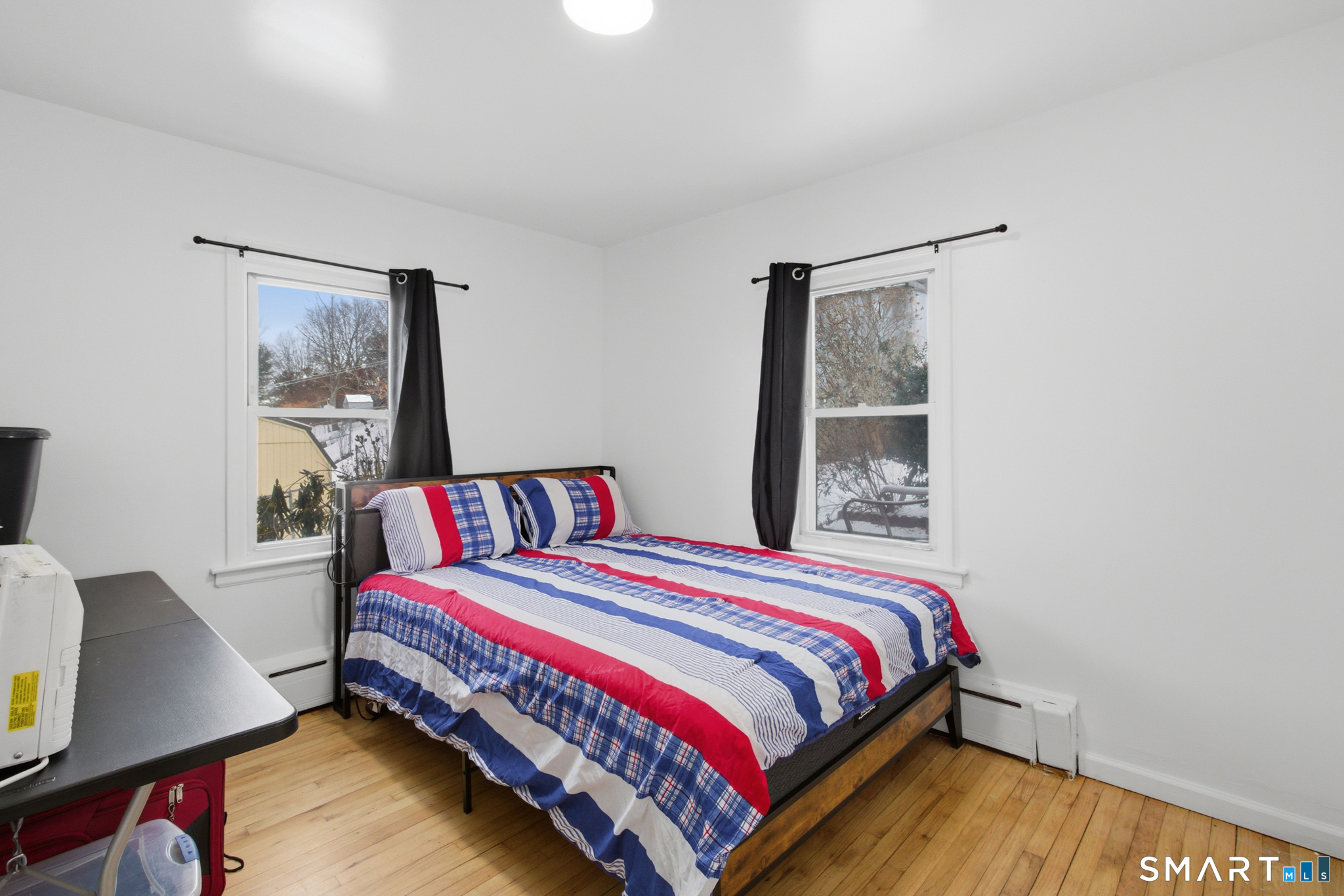 590 North Walnut Street Waterbury, CT 06704 - Photo 31 of 37 a bedroom with a bed and a window