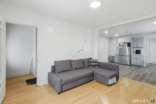 a living room with furniture and a couch