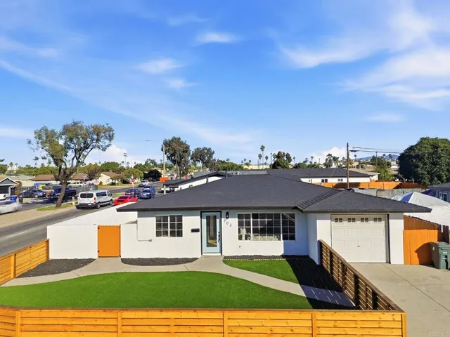 a view of a house with a swimming pool