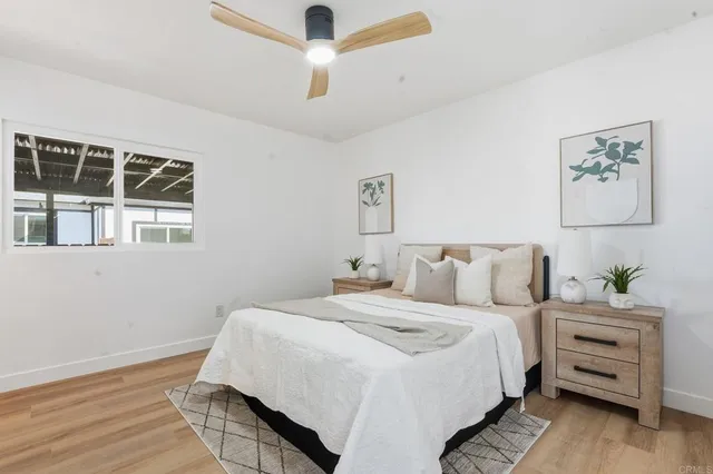 a view of an empty room with wooden walls