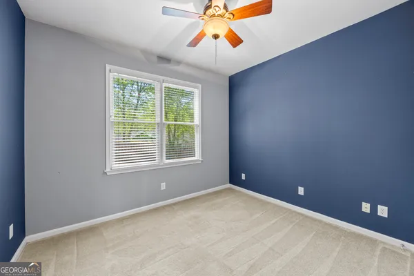 a view of a dining room with furniture wooden floor and chandelier