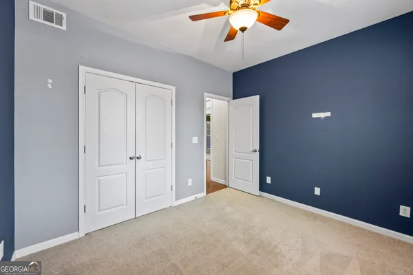 a kitchen with a stove a sink and a refrigerator