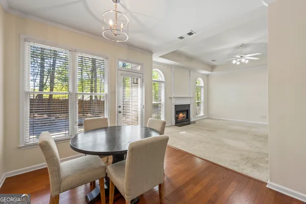 a view of an empty room and a window