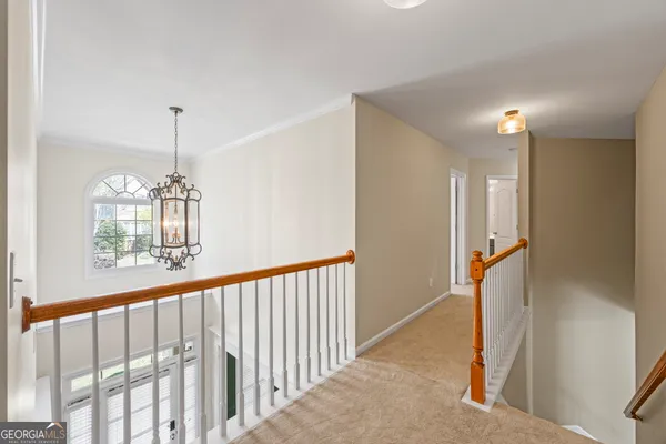 a bathroom with a toilet and a bathtub