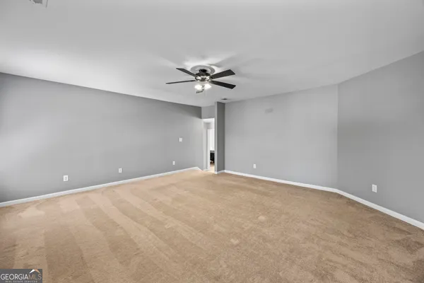 a view of a room that has a window in it