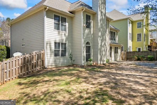 a front view of a house with a garage