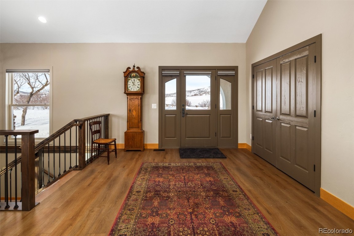 43750 Diamondback Way Steamboat Springs, CO 80487 - Photo 25 of 50 wooden floor with a window in a hall with wooden floor
