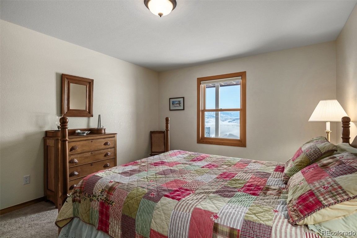 43750 Diamondback Way Steamboat Springs, CO 80487 - Photo 33 of 50 a bedroom with a bed and a closet