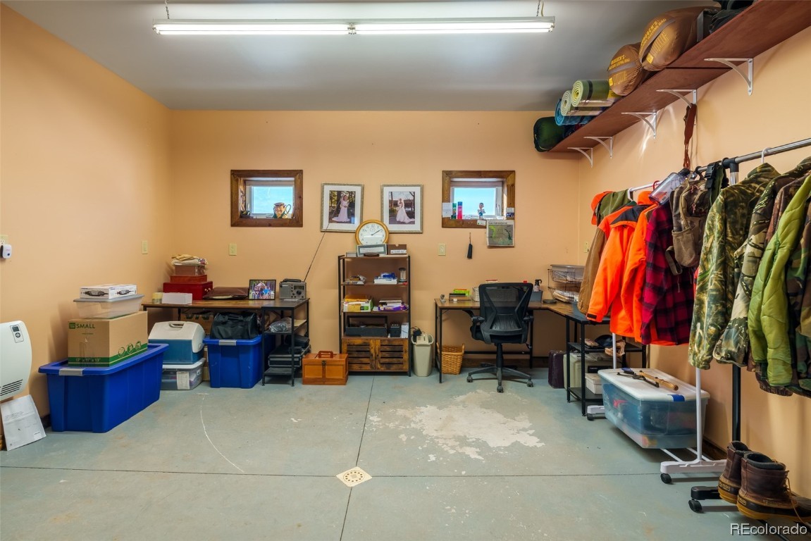 43750 Diamondback Way Steamboat Springs, CO 80487 - Photo 41 of 50 a view of walk in closet with clothes and shoes