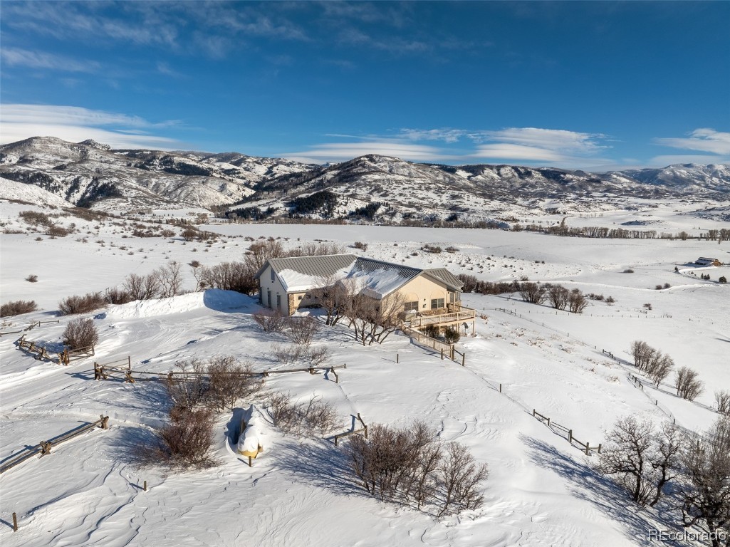 43750 Diamondback Way Steamboat Springs, CO 80487 - Photo 47 of 50 a view of roof with wooden floor and city view