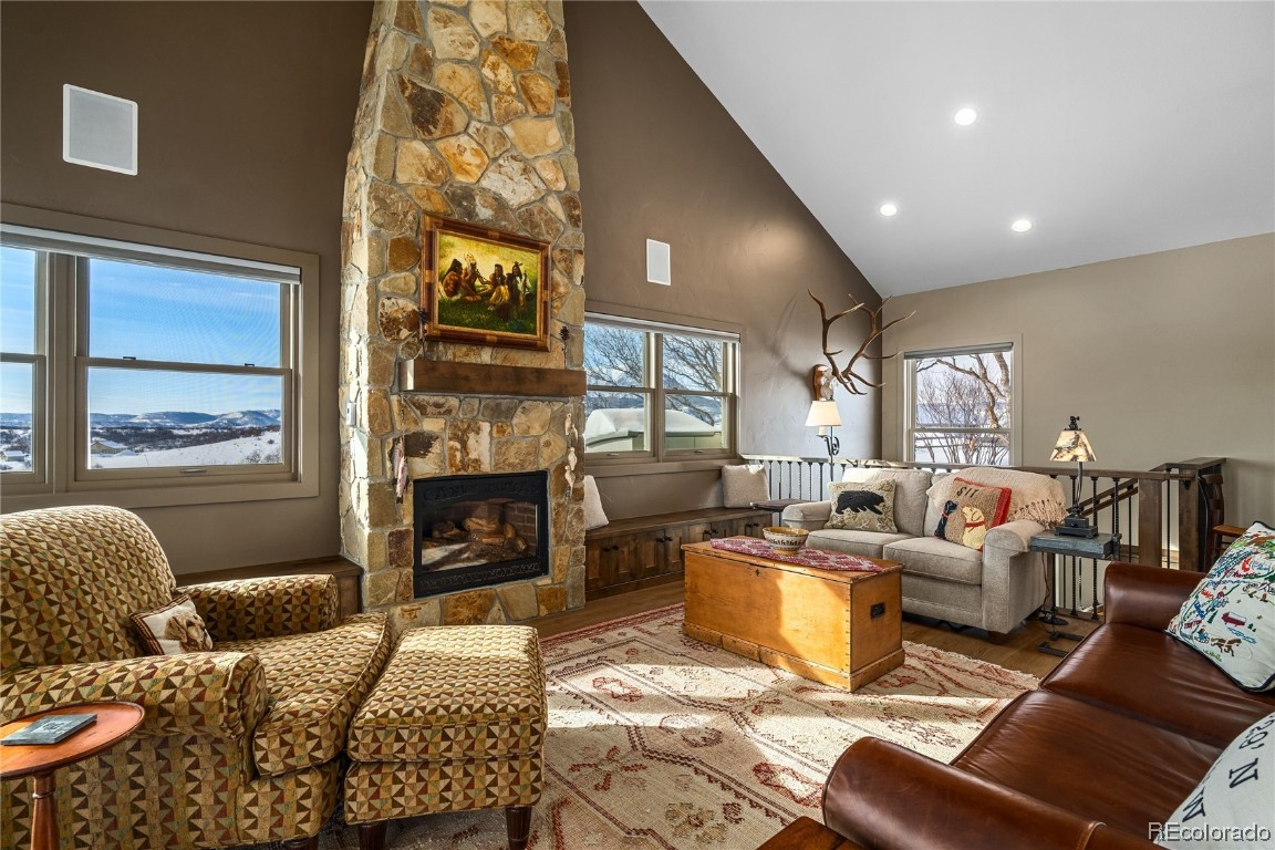 43750 Diamondback Way Steamboat Springs, CO 80487 - Photo 6 of 50 a bedroom with furniture and a fireplace