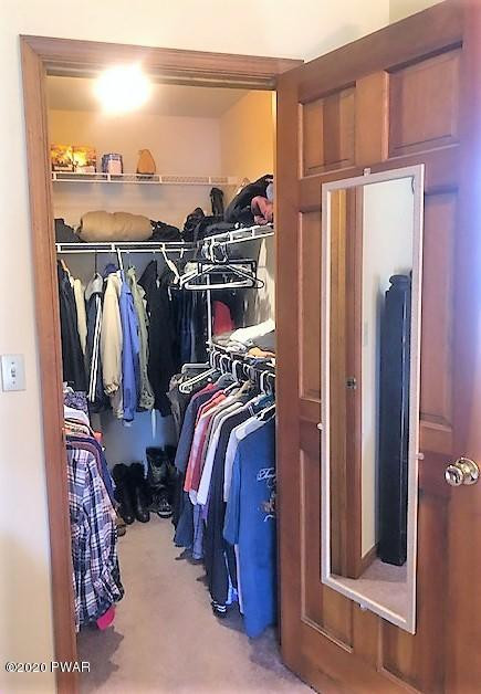 171 Valleyview Road Greentown, PA 18426 - Photo 59 of 111 a view of walk in closet with clothes and shoes