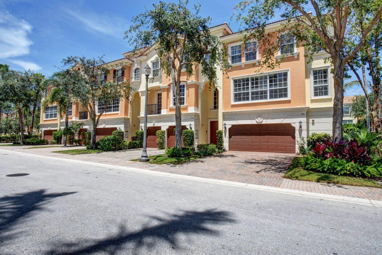 5610 Northeast Trieste Terrace Boca Raton, FL 33487 - Photo 44 of 44 a front view of a building with street view