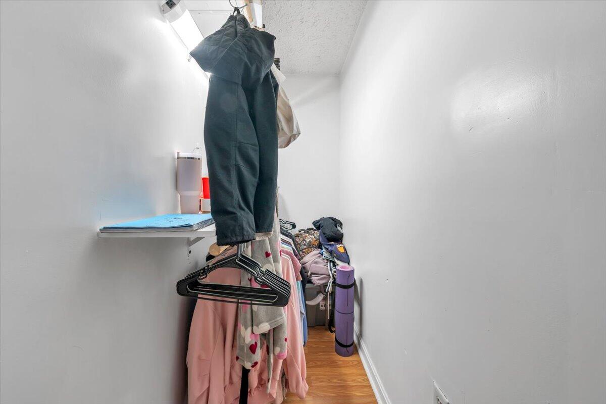 3870 Goose Dam Road Rocky Mount, VA 24151 - Photo 27 of 44 a view of walk in closet with clothes