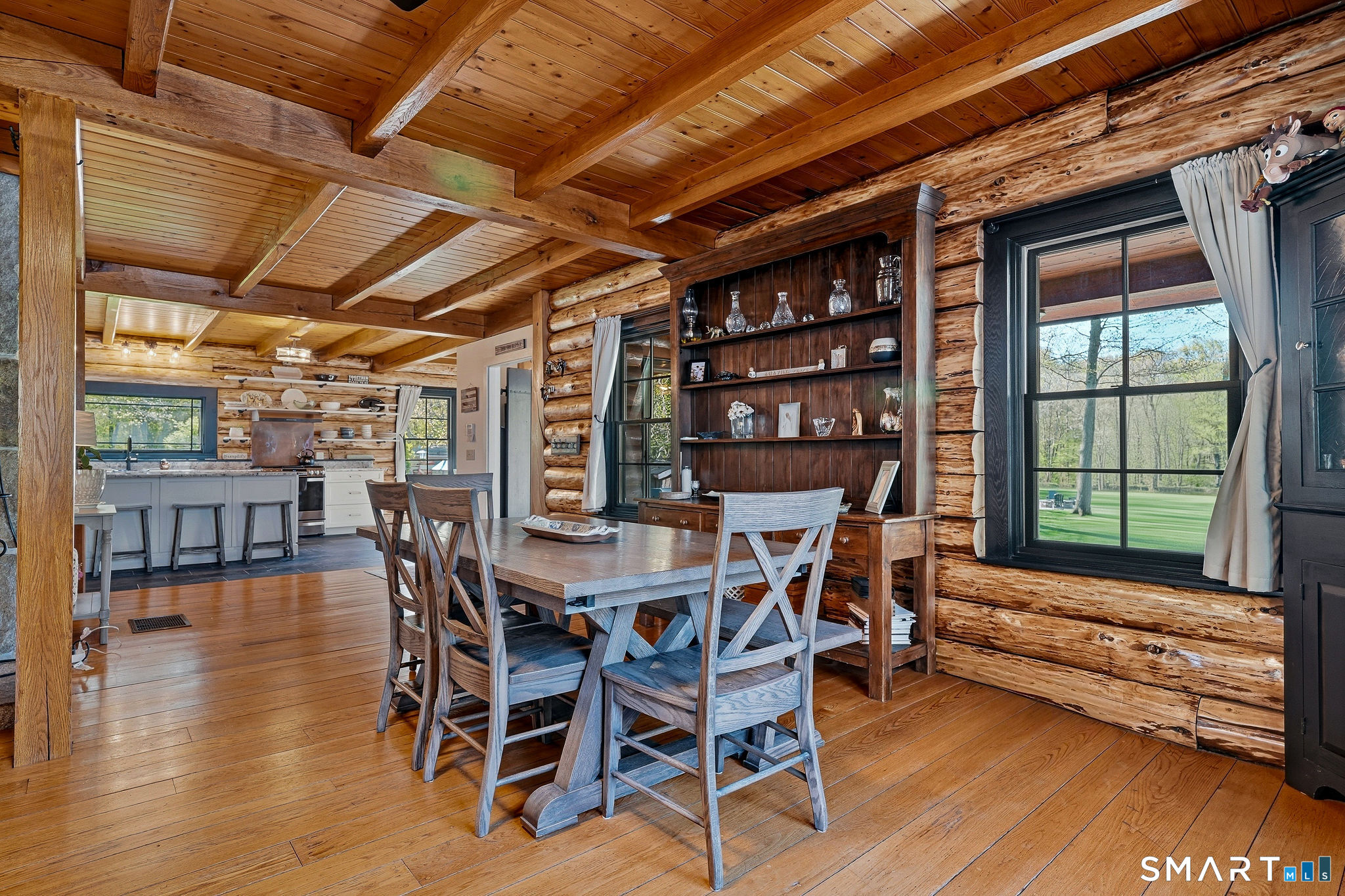 61 Mystic Road North Stonington, CT 06359 - Photo 13 of 40 a dining room with furniture and wooden floor