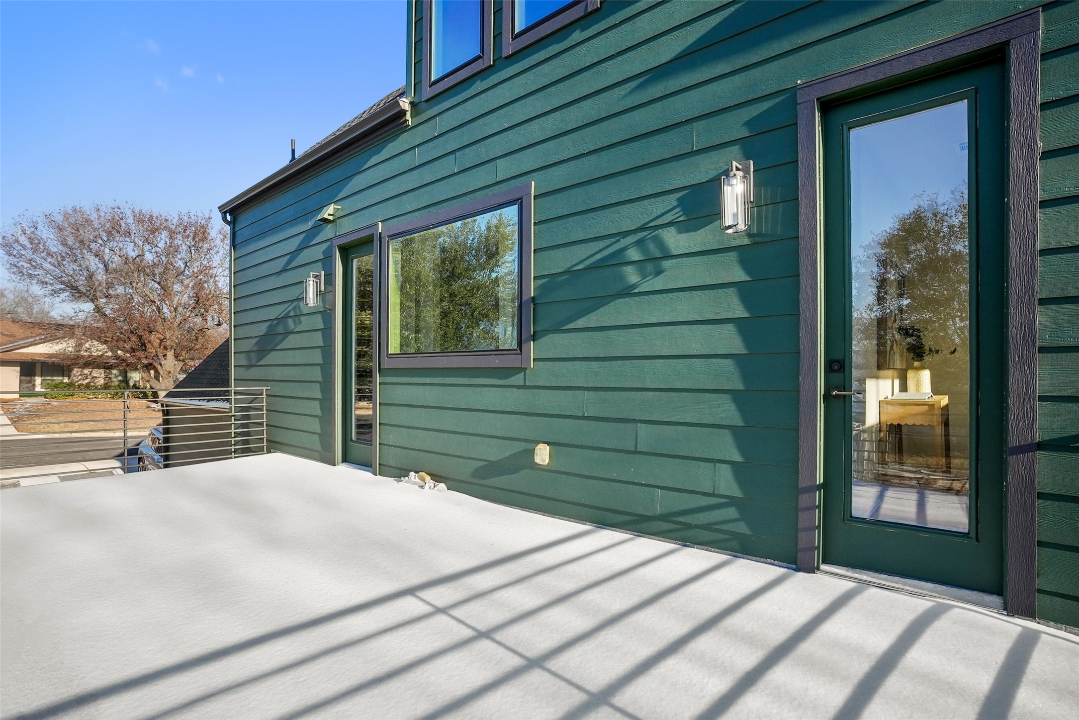 5109 Stone Gate Drive, Unit 2 Austin, TX 78721 - Photo 28 of 36 Outdoor patio space featuring a horizontal metal railing