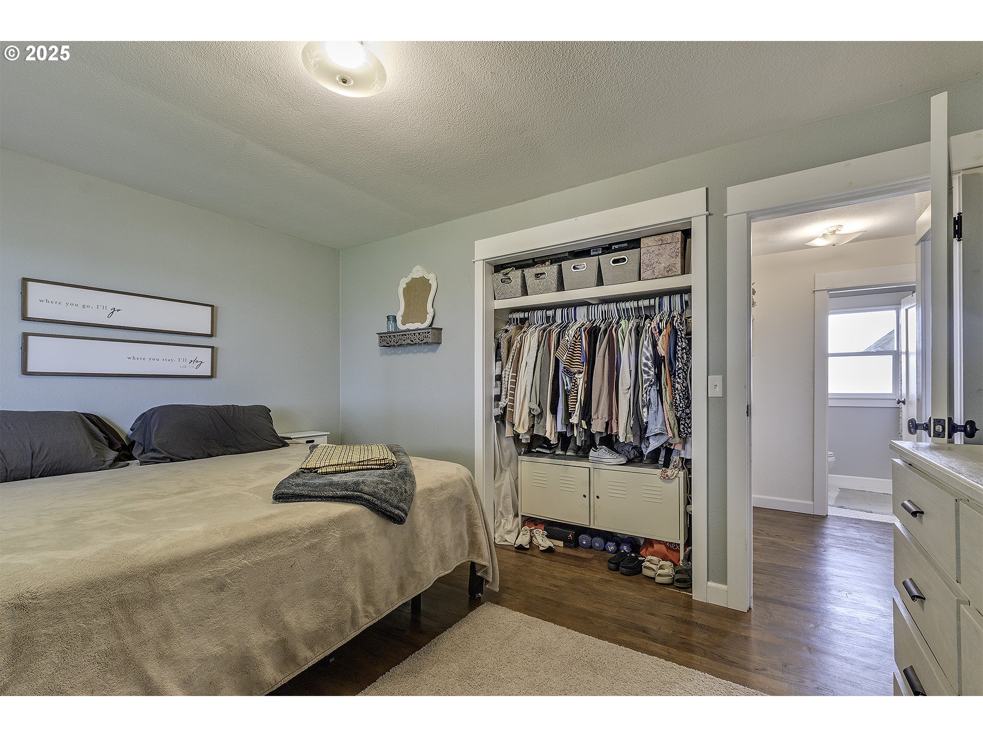 40748 Northwest Verboort Road Forest Grove, OR 97116 - Photo 12 of 28 a bedroom with a bed and walk in closet