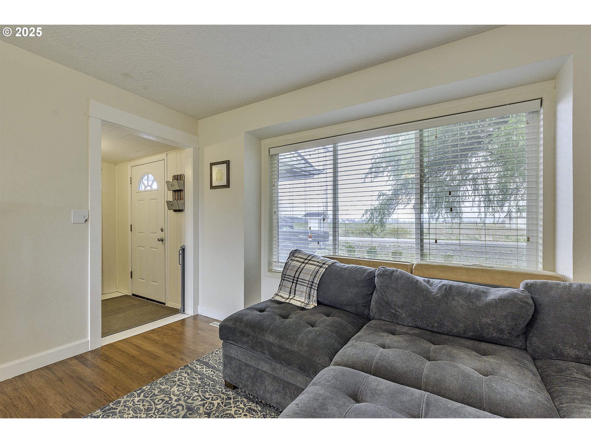 40748 Northwest Verboort Road Forest Grove, OR 97116 - Photo 5 of 28 a living room with furniture and a large window