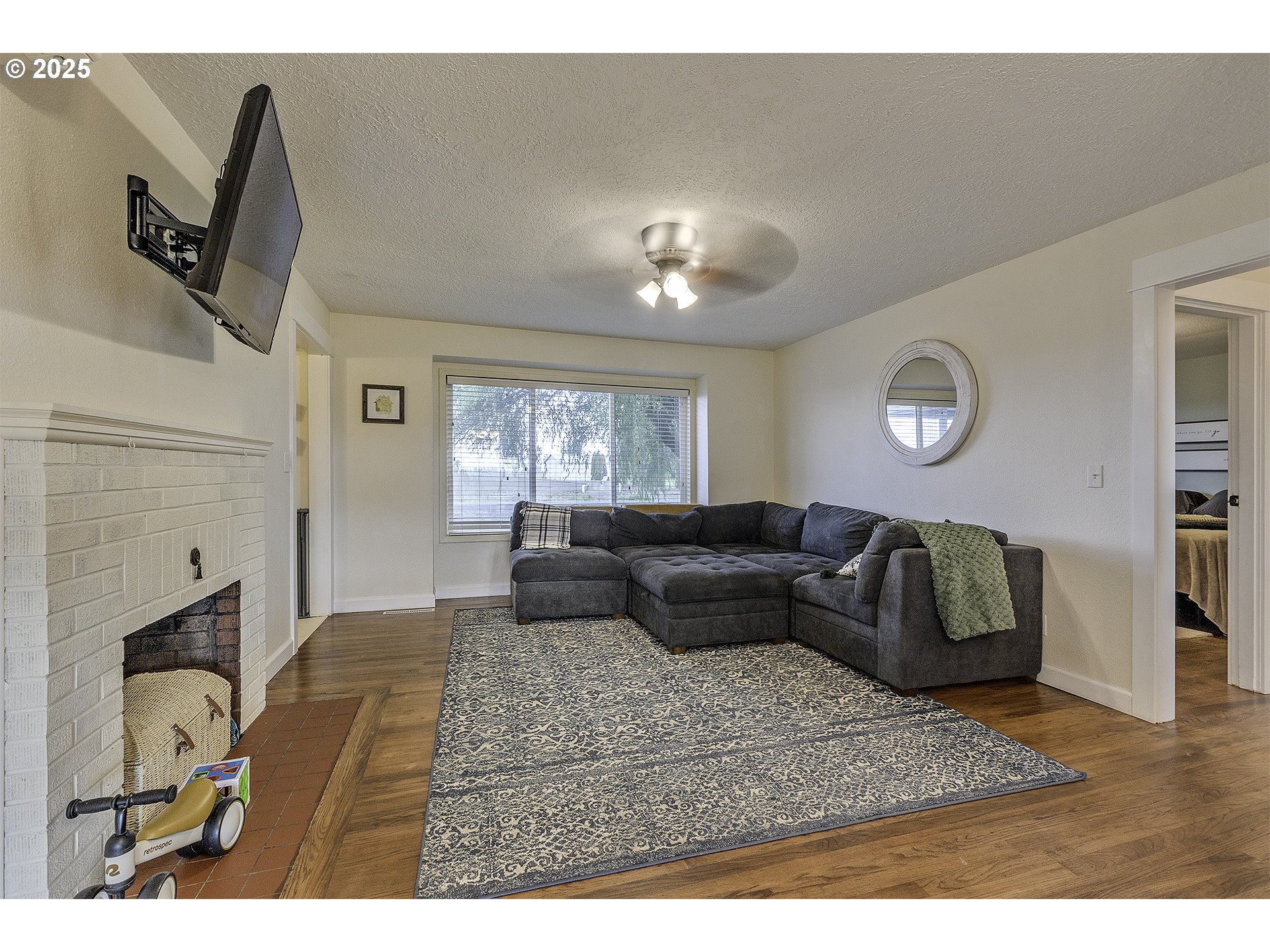 40748 Northwest Verboort Road Forest Grove, OR 97116 - Photo 6 of 28 a living room with furniture and a flat screen tv