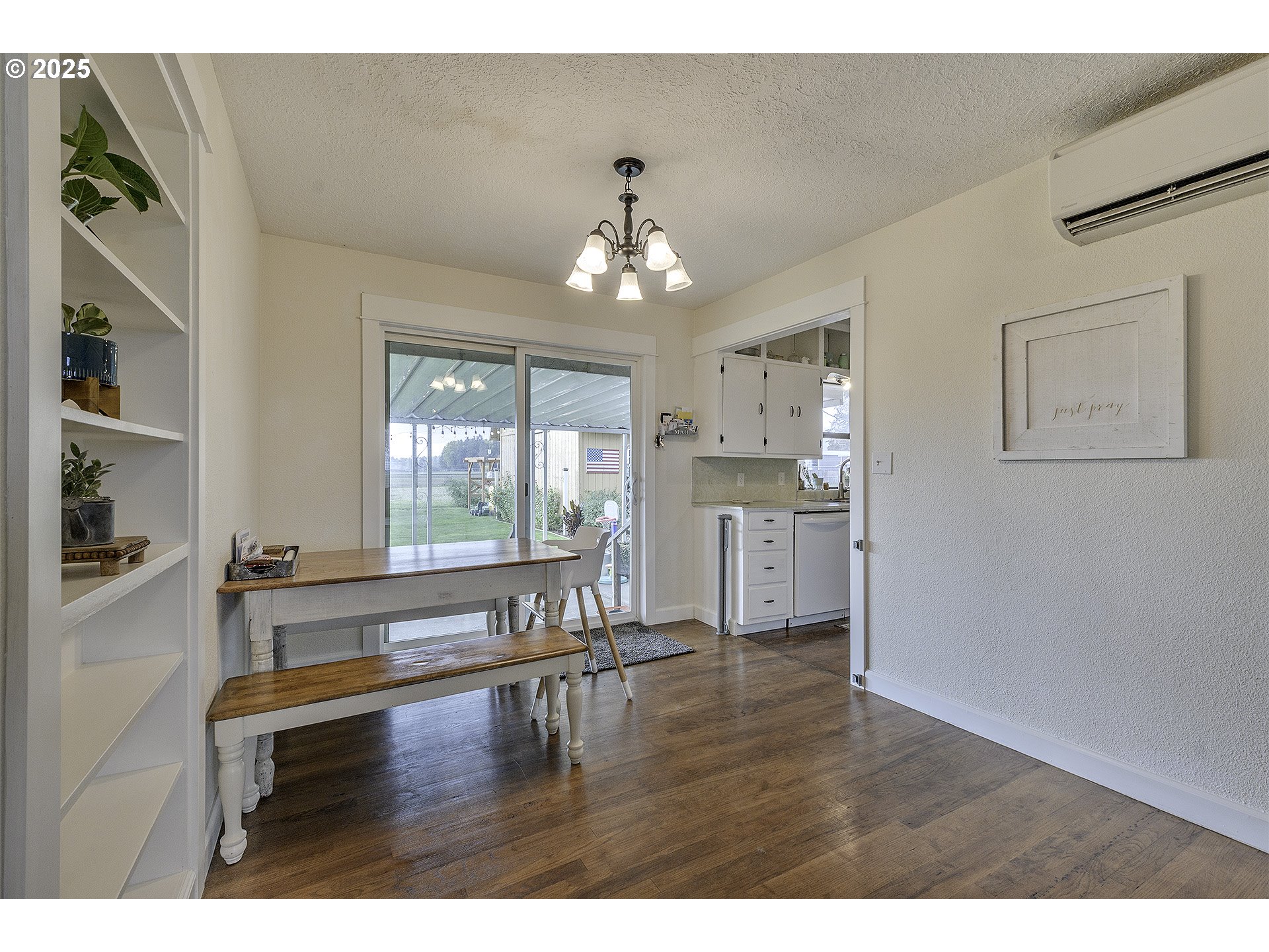 40748 Northwest Verboort Road Forest Grove, OR 97116 - Photo 8 of 28 a living room with kitchen view and large windows