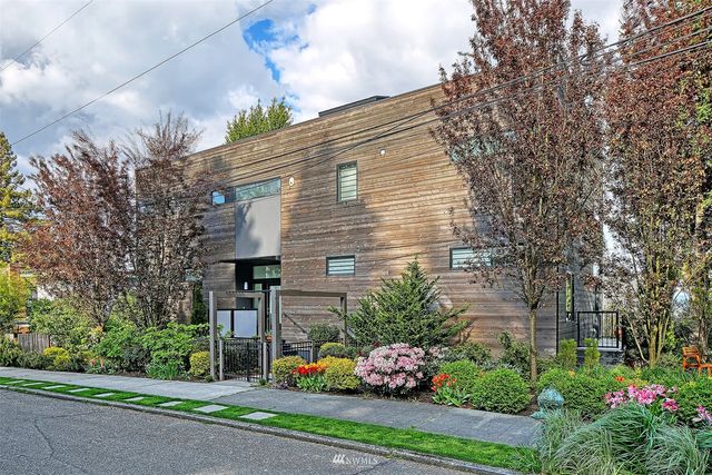 a view of a chair and table in a yard