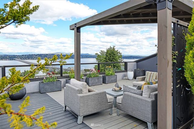 a outdoor living space with furniture and garden view