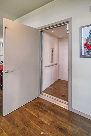 a view of a backyard with sitting area and garden