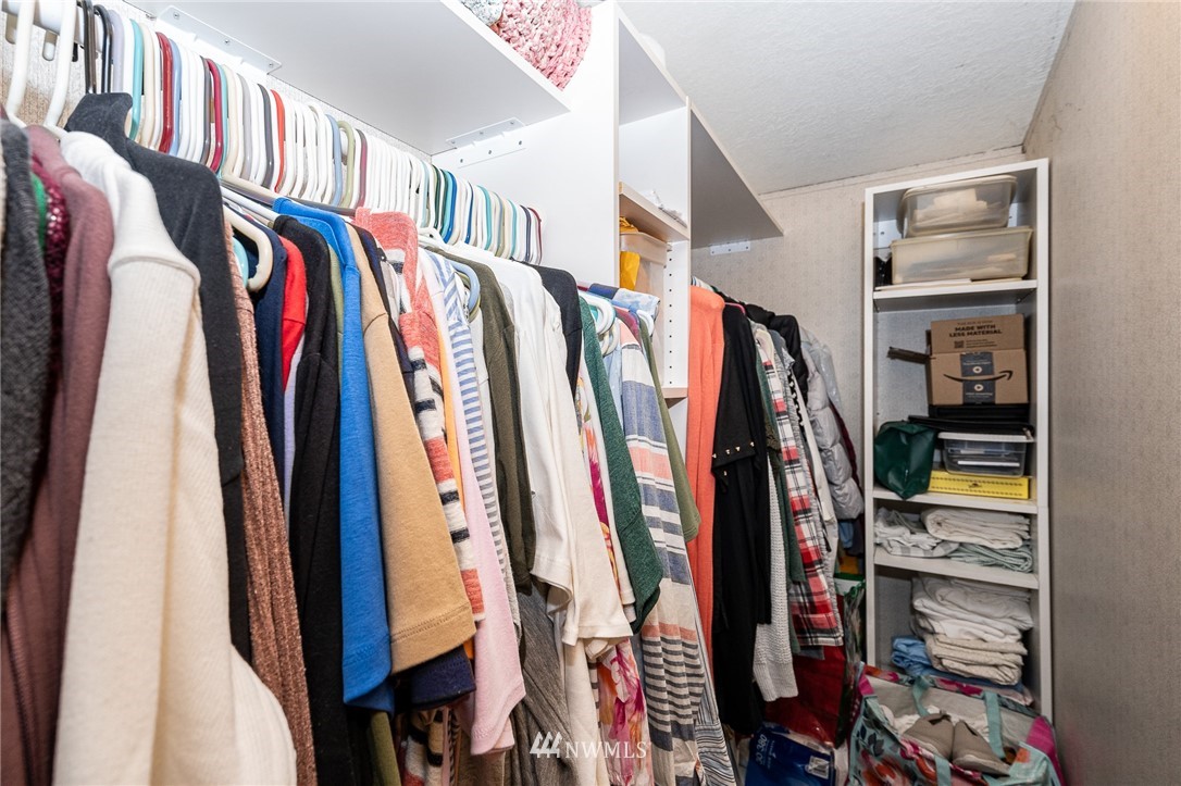 368 Jones Road Winlock, WA 98596 - Photo 21 of 39 a view of walk in closet with clothes