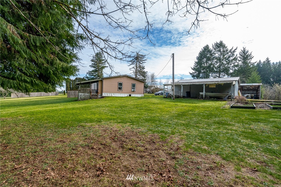 368 Jones Road Winlock, WA 98596 - Photo 3 of 39 a view of a house with a yard porch and sitting area