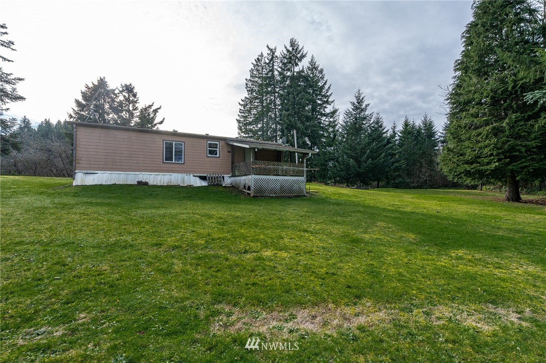 368 Jones Road Winlock, WA 98596 - Photo 38 of 39 a backyard of a house with lots of green space