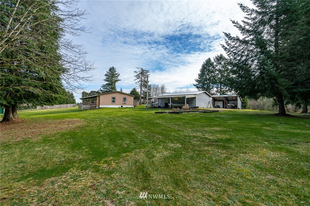 368 Jones Road Winlock, WA 98596 - Photo 9 of 39 a house view with a sitting space and garden view