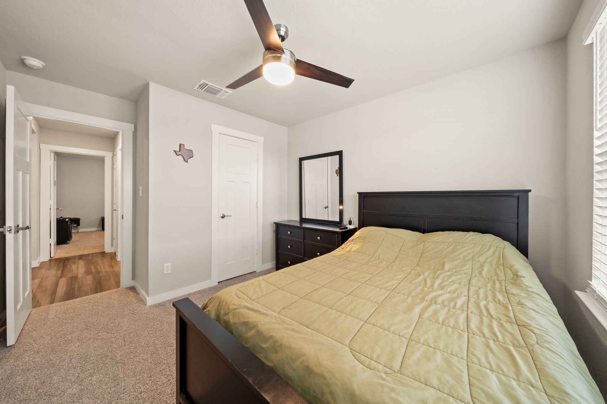 1117 Tipton Street Georgetown, TX 78633 - Photo 27 of 40 Carpeted room featuring a ceiling fan with light, white trim, and a window with blinds