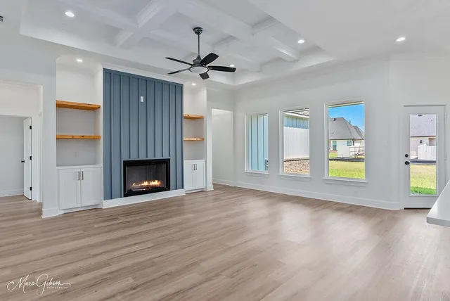 a view of kitchen with window and wooden floor