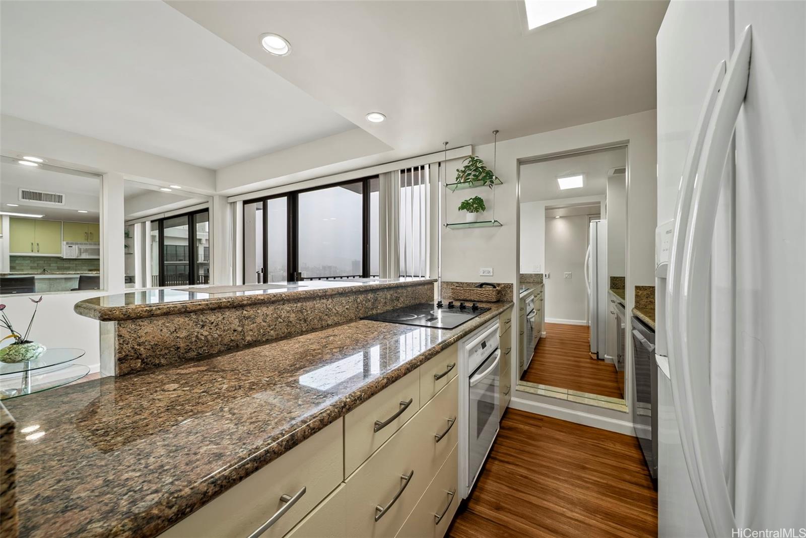 225 Queen Street, Unit 26D Honolulu, HI 96813 - Photo 6 of 24 Cooking in your nice kitchen