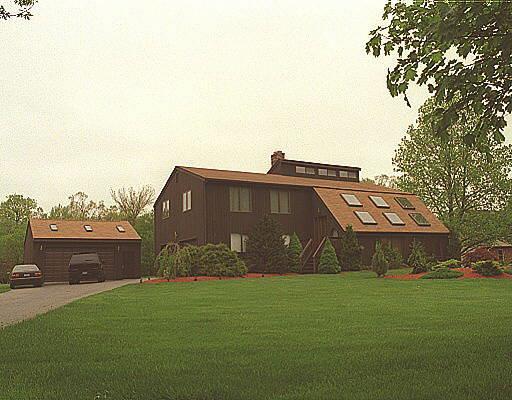 325 Mohegan Road Shelton, CT 06484 - Photo 1 of 1 a front view of a house with garden