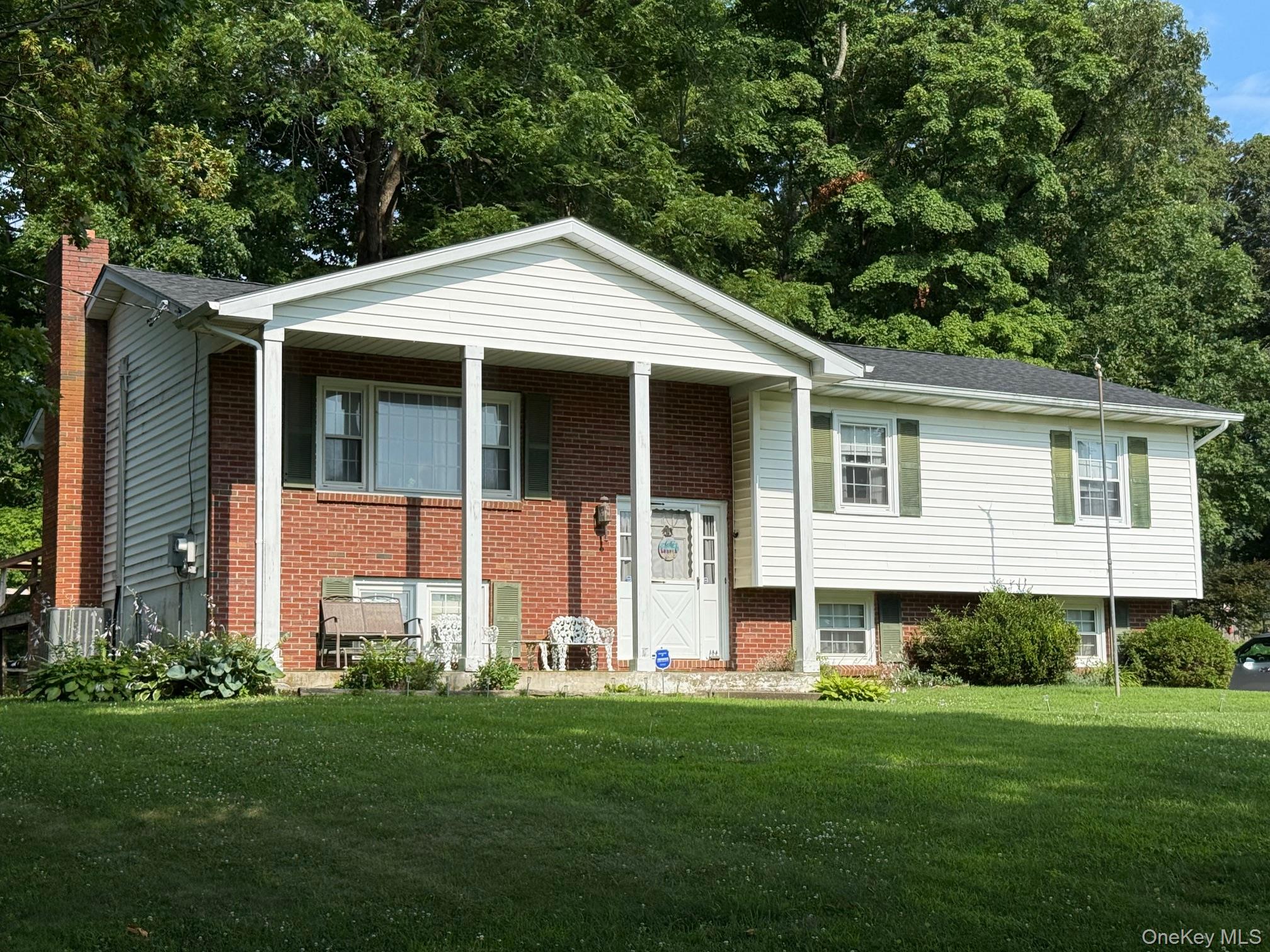 51 Depot Hill Road Amenia, NY 12501 - Photo 15 of 18 a front view of a house with a yard