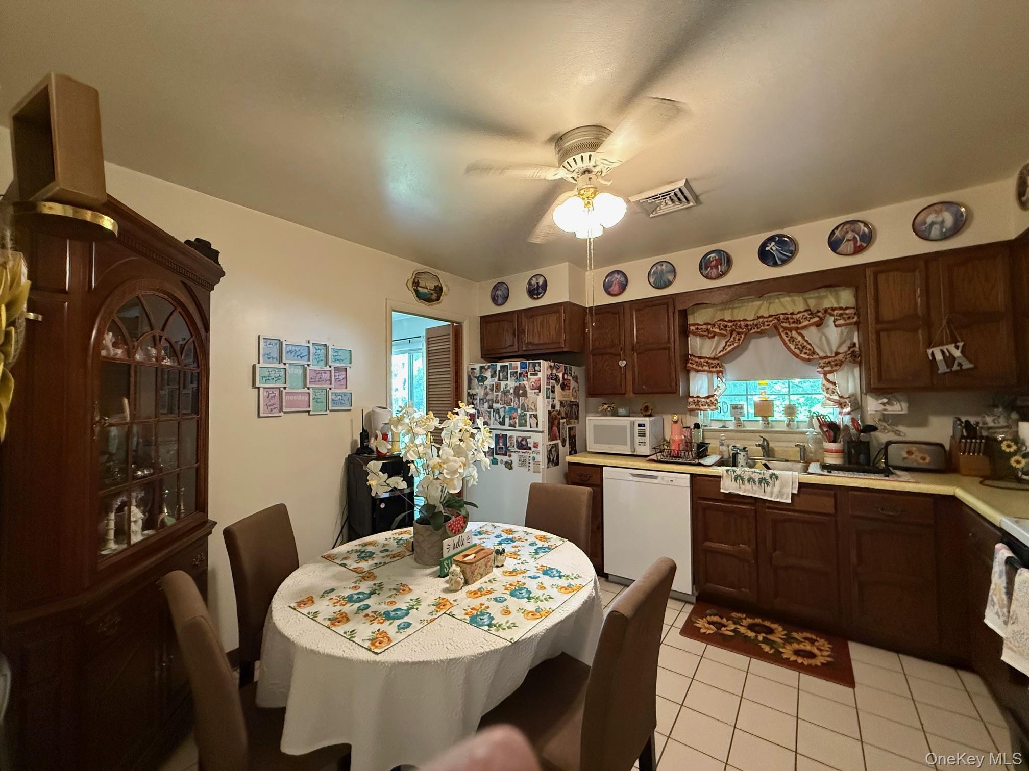 51 Depot Hill Road Amenia, NY 12501 - Photo 4 of 18 a kitchen with a dining table and chairs