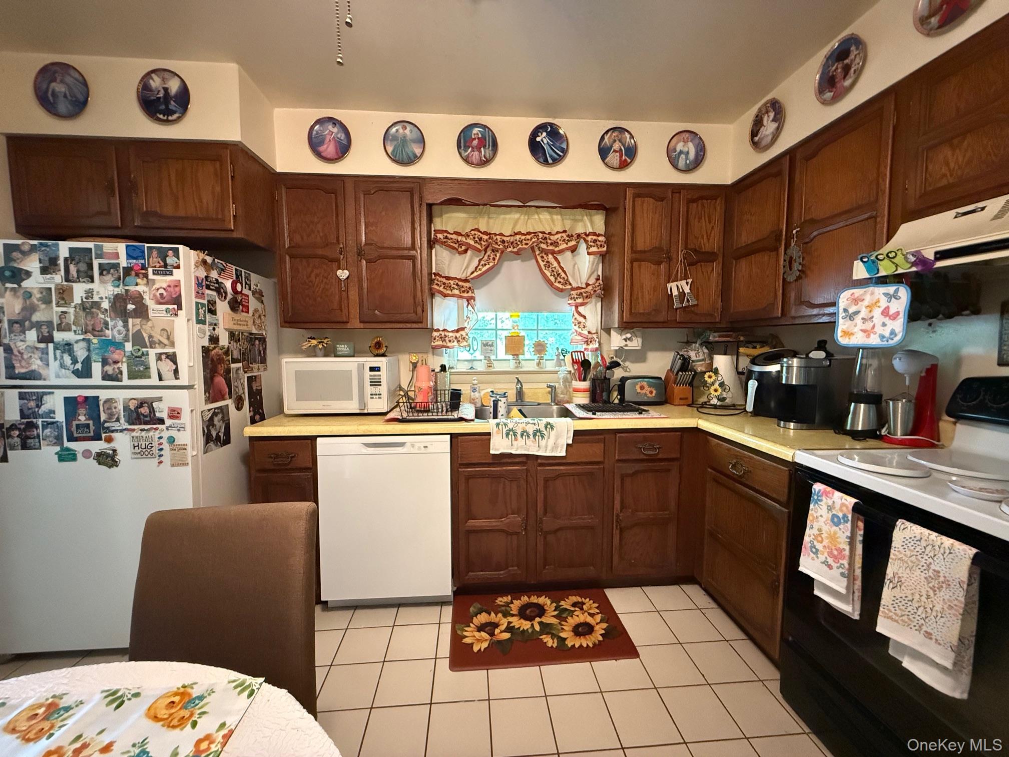 51 Depot Hill Road Amenia, NY 12501 - Photo 5 of 18 a kitchen with a sink a stove a microwave and cabinets