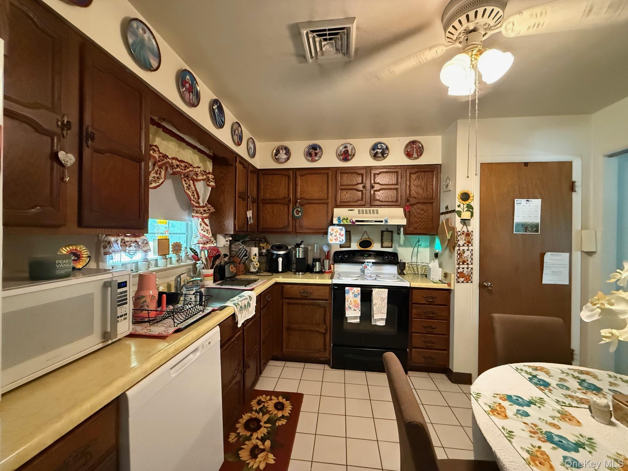 51 Depot Hill Road Amenia, NY 12501 - Photo 6 of 18 a kitchen with stainless steel appliances a stove a sink and cabinets
