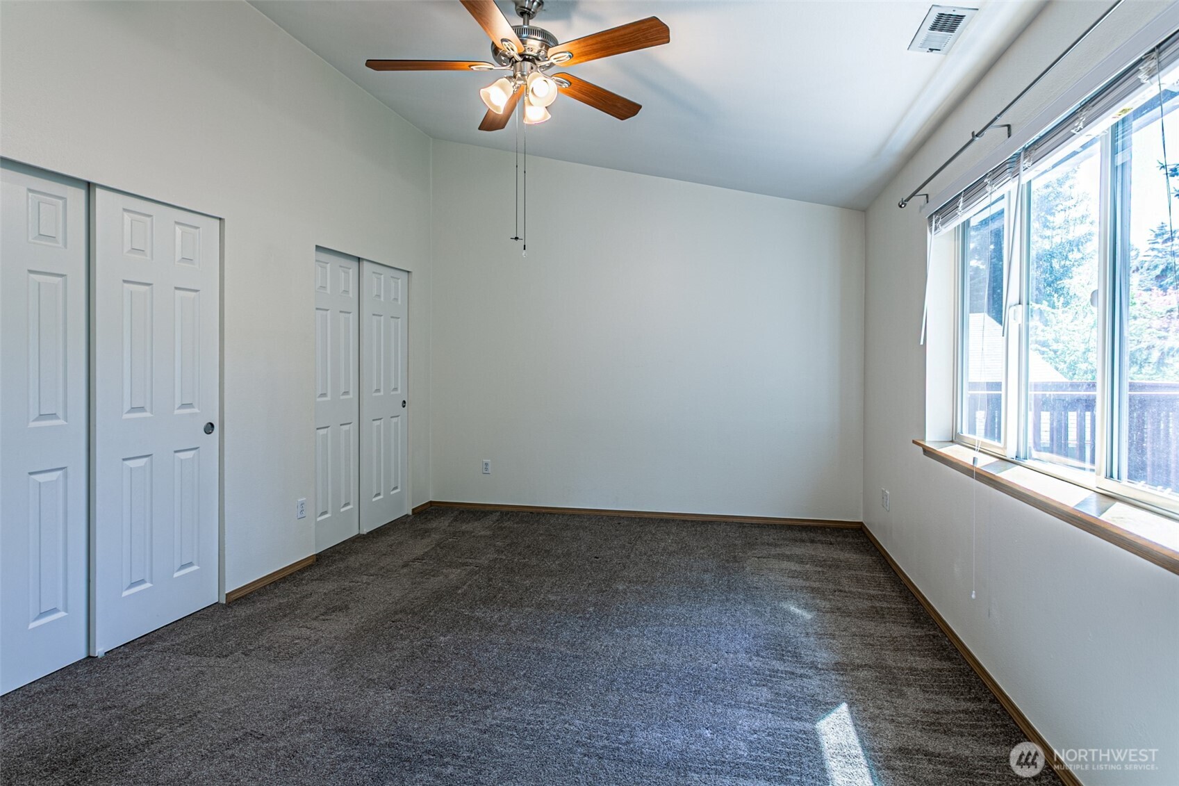 8342 49th Loop Southeast Olympia, WA 98513 - Photo 11 of 24 a view of an empty room with a window