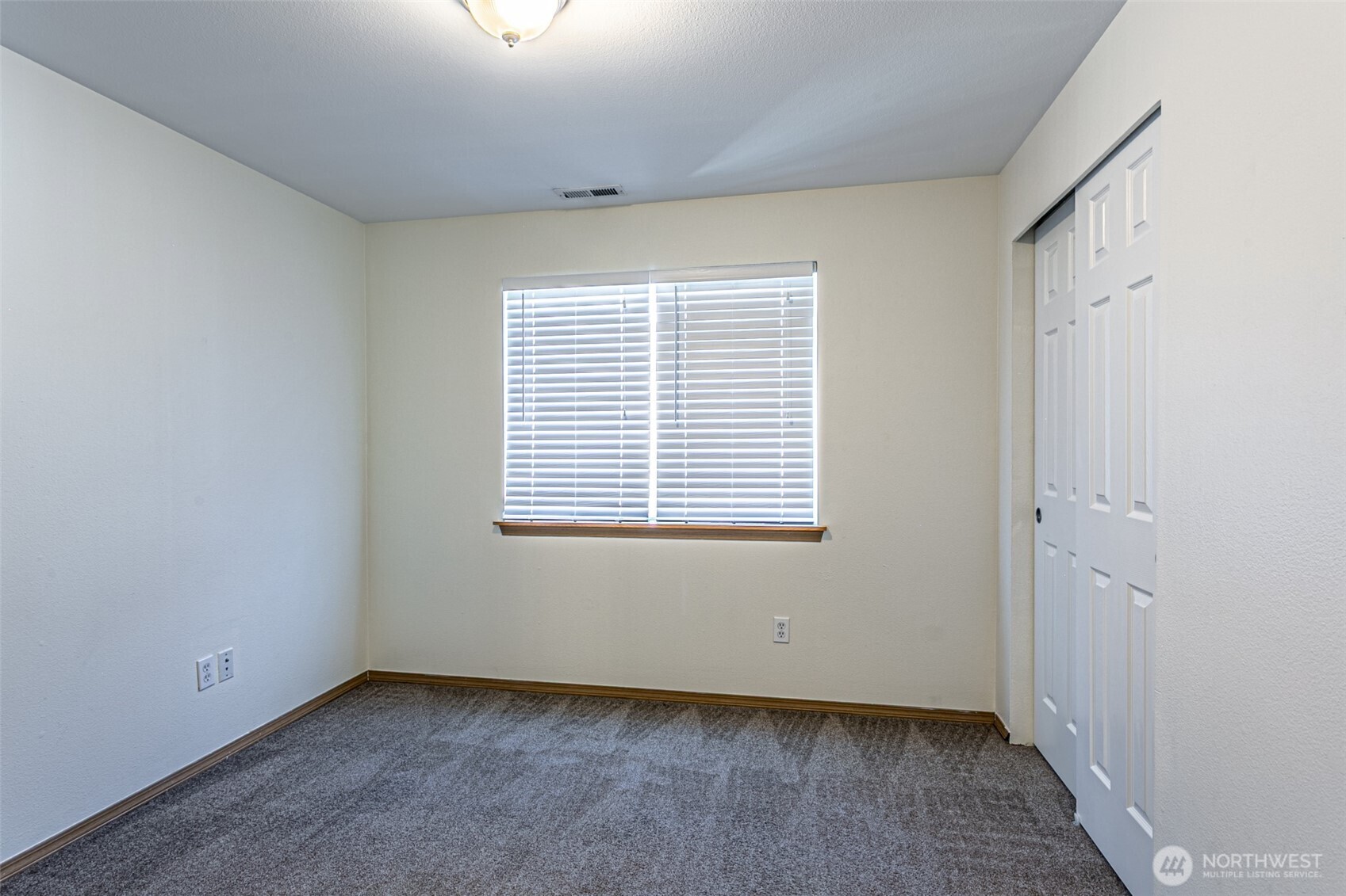 8342 49th Loop Southeast Olympia, WA 98513 - Photo 15 of 24 a view of an empty room with a window