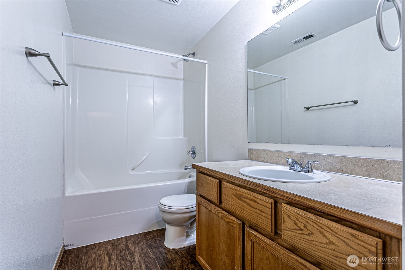 8342 49th Loop Southeast Olympia, WA 98513 - Photo 16 of 24 a bathroom with a sink toilet and shower