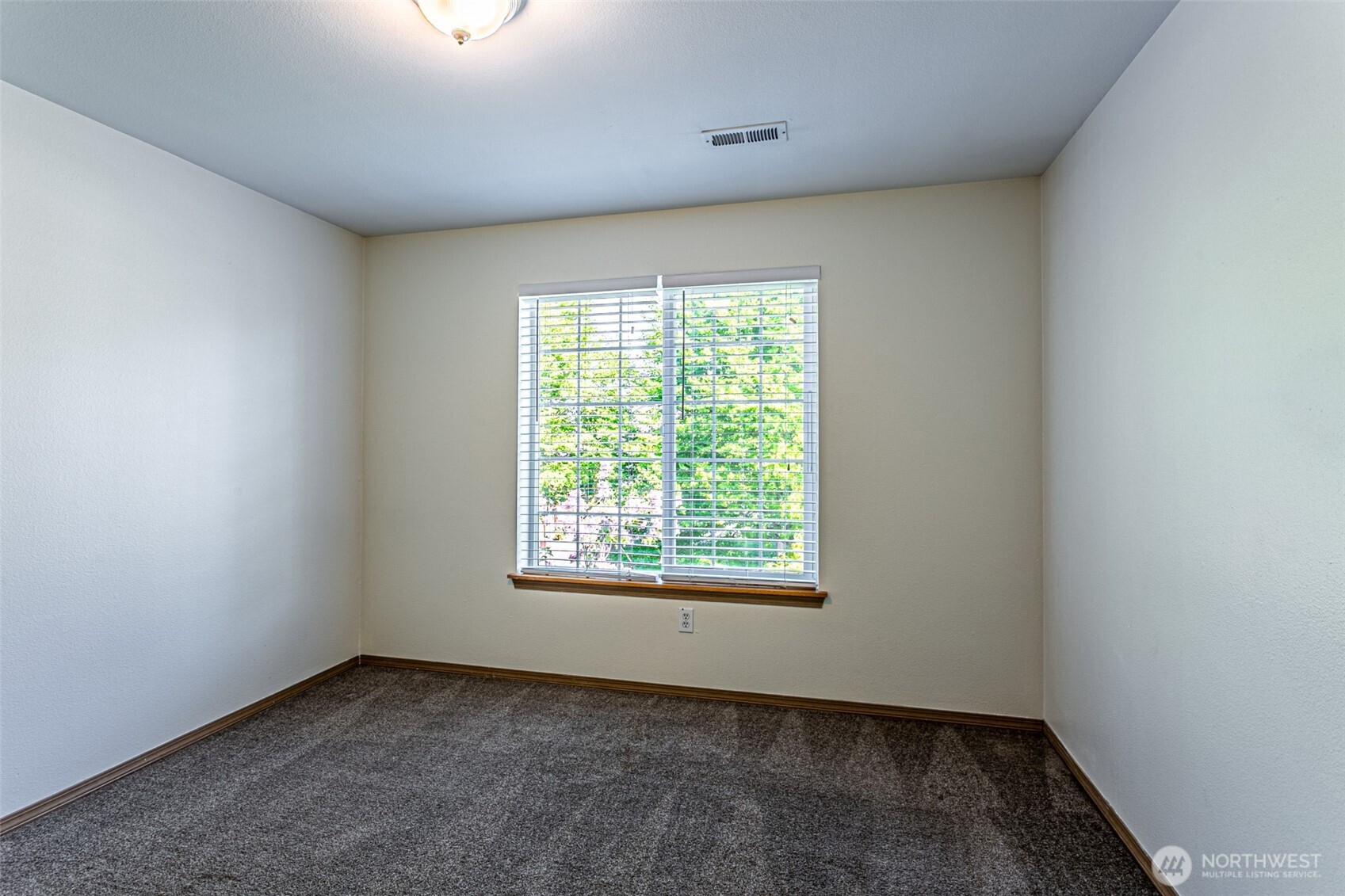 8342 49th Loop Southeast Olympia, WA 98513 - Photo 17 of 24 an empty room with a window